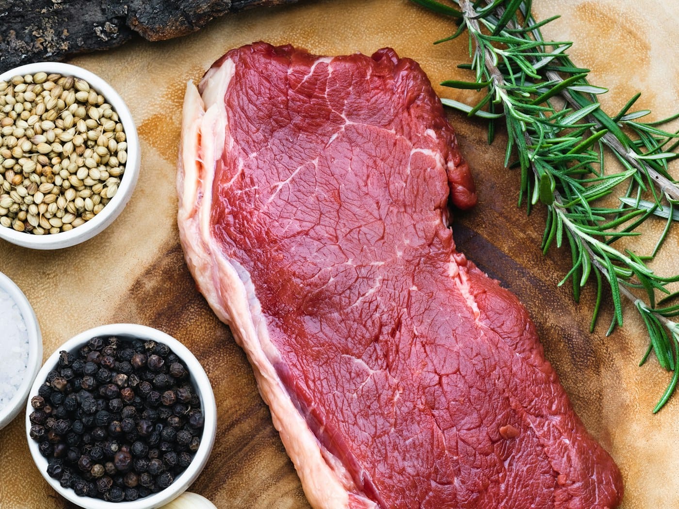 Raw beef striploin on butcher's paper
